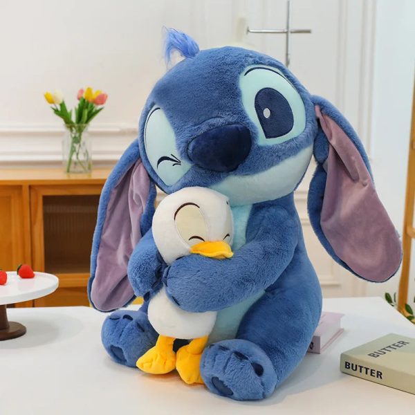 Cute 45cm Stitch Plush Doll - Perfect Gift for Kids & Kawaii Decor! Cute 45cm Stitch Plush Doll - Perfect Gift for Kids & Kawaii Decor!