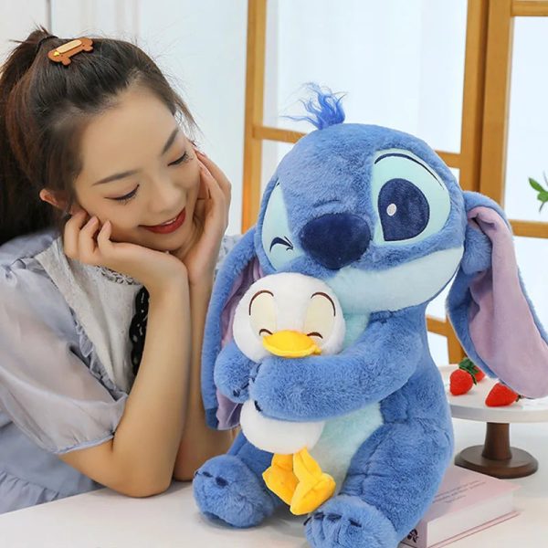 Cute 45cm Stitch Plush Doll - Perfect Gift for Kids & Kawaii Decor! Cute 45cm Stitch Plush Doll - Perfect Gift for Kids & Kawaii Decor!